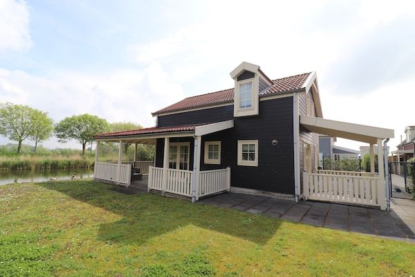Buitenkant - Zonovergoten bungalow in Simonshaven in Simonshaven (1)