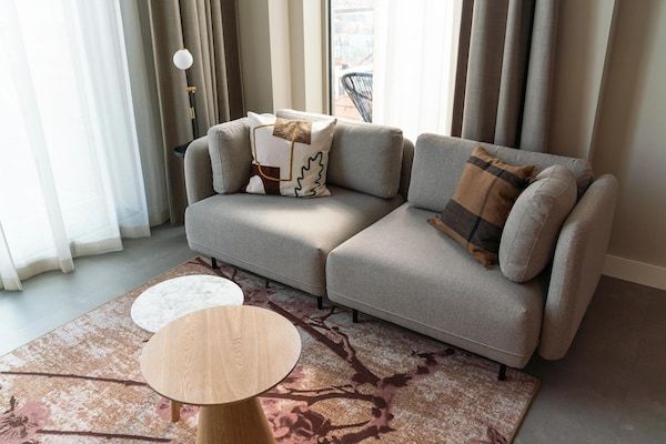 Woonkamer - appartement met adembenemend uitzicht op de stad. in Den Haag (1)