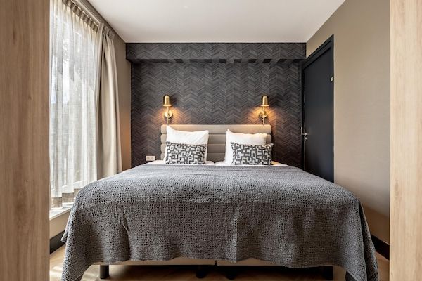 Slaapkamer - Modern overnachten in historisch Delft in Den Haag (3)