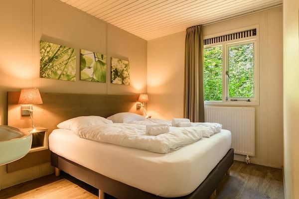 Slaapkamer - Bosbungalow voor 4 personen op de Veluwe in Putten (4)