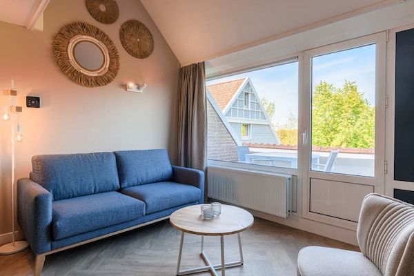 Woonkamer - Appartement vlakbij voorzieningen in het centrum in Bruinisse (1)