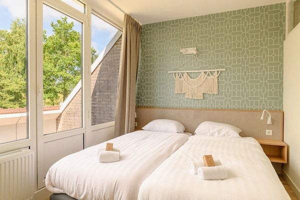 Slaapkamer - Wellnessappartement met sauna, uitzicht in Bruinisse (3)