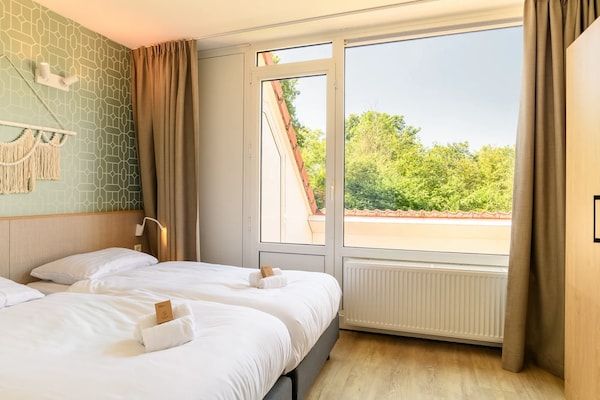 Slaapkamer - Kindvriendelijk appartement met themakamers in Bruinisse (3)