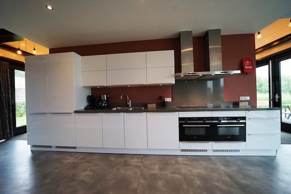 Keuken - Designchalet voor 6 personen met open haard in Nijkerk (5)