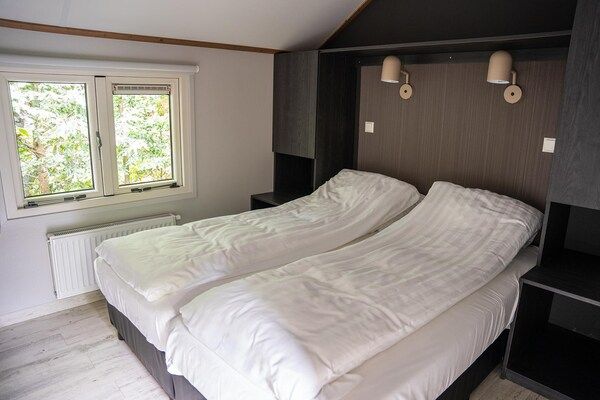 Slaapkamer - Bosboerderij met privétuin in Ermelo (5)