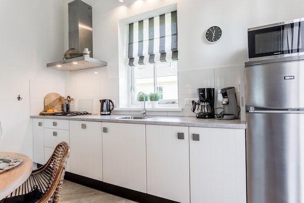 Keuken - Bungalow bij kust en bos in Noordwijk (4)