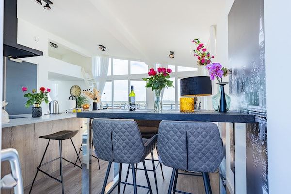 Eetkamer - Penthouse met uitzicht op het strand in Sint-Annaland (2)