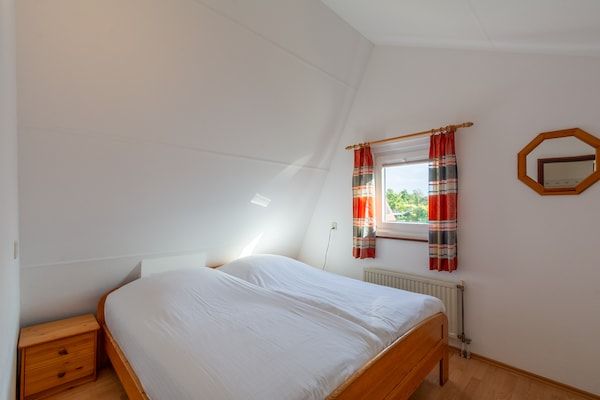 Slaapkamer - Heerlijk vakantiehuis in Julianadorp in Julianadorp aan Zee (3)