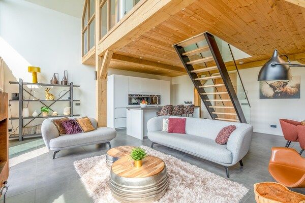 Woonkamer - sfeervolle en moderne 6-persoons vakantievilla in De Koog (4)