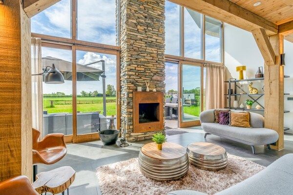 Woonkamer - sfeervolle en moderne 6-persoons vakantievilla in De Koog (5)