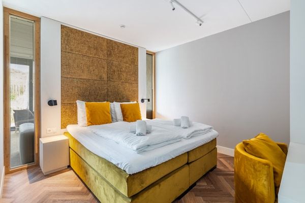 Slaapkamer - Uitnodigend appartement met tuin in Sint Maartenszee (2)