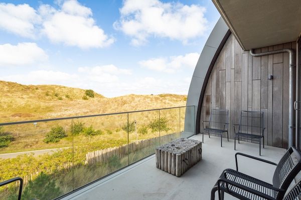 Terras - Luxe appartement met privésauna in Sint Maartenszee (3)