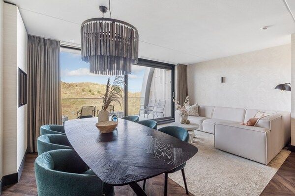 Woonkamer - Luxe appartement met privésauna in Sint Maartenszee (1)