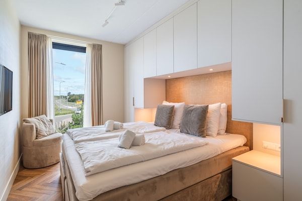 Slaapkamer - Appartement met balkon en uitzicht op de duin in Sint Maartenszee (2)