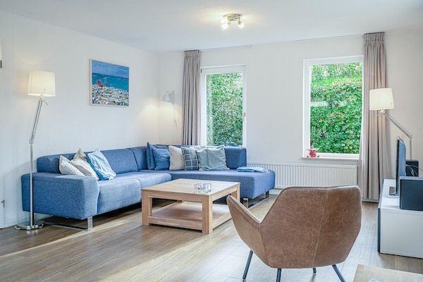 Woonkamer - Sfeervolle villa nabij zee en bos in De Koog (3)