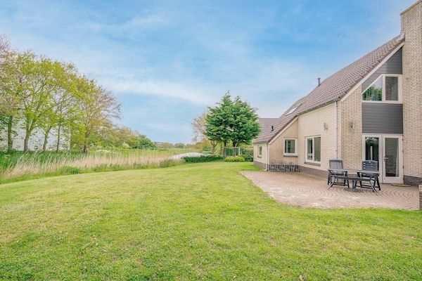 Tuin - Sfeervolle villa nabij zee en bos in De Koog (2)