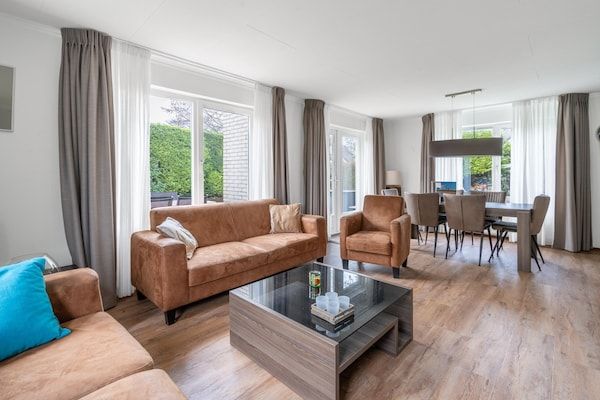 Woonkamer - Sfeervolle villa nabij zee en bos in De Koog (4)