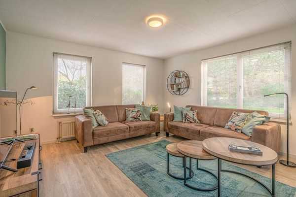 Woonkamer - Sfeervolle villa met sauna en tuin op het zuiden in De Koog (3)