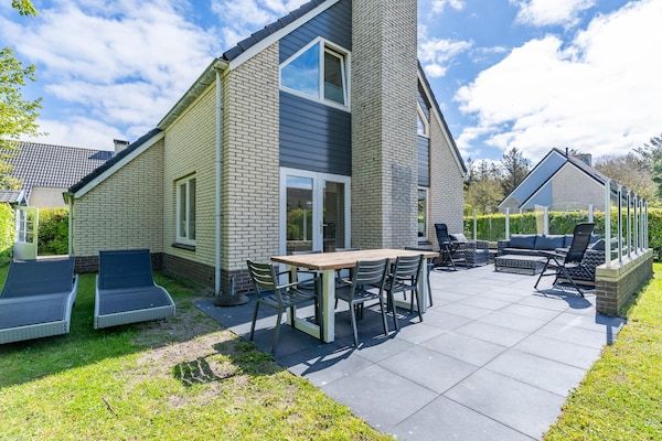 Buitenkant - Sfeervolle villa met houtkachel nabij zee en bos in De Koog (1)