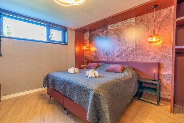 Slaapkamer - Moderne, luxe en duurzame natuurvilla in De Waal (5)