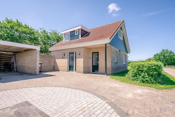 Buitenkant - Sfeervol 5 persoons vakantiehuis met weids uitzicht in De Koog (1)