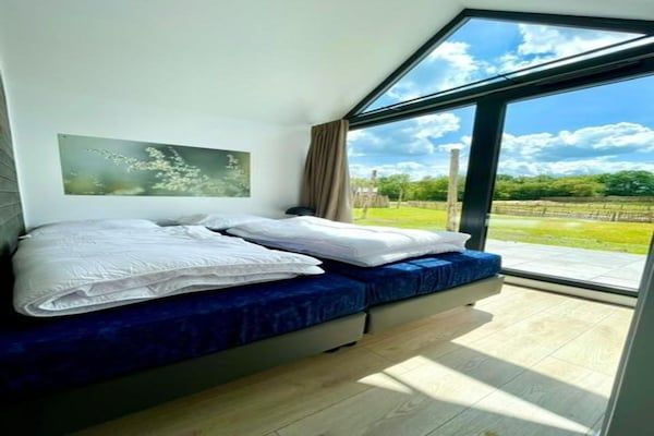 Slaapkamer - Gezellig vakantiehuis aan de visvijver in Balkbrug (3)
