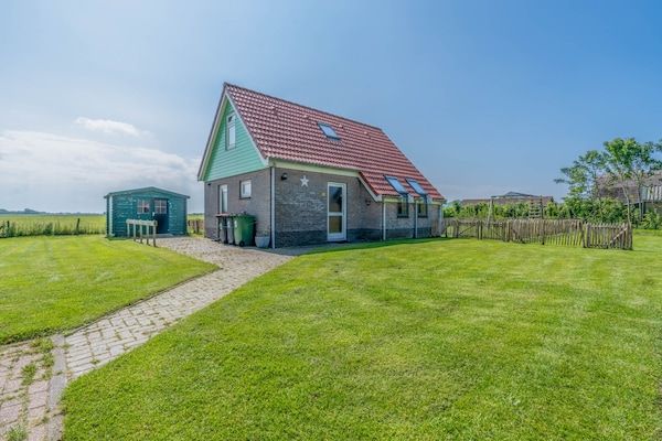 Buitenkant - Vrijstaande vakantiewoning met landelijk uitzicht in De Cocksdorp (1)