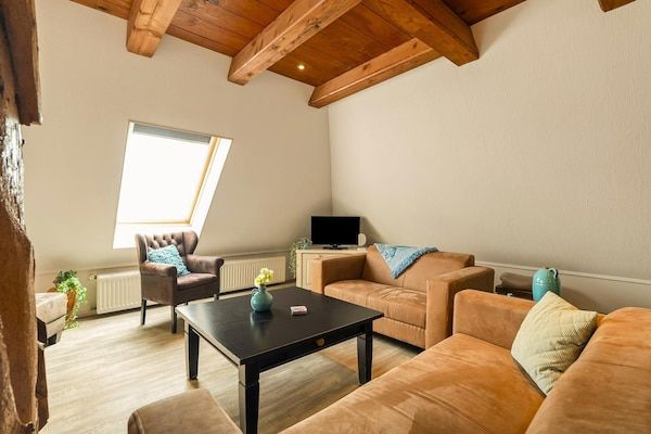Woonkamer - Appartement Boerderij bij het strand in Schagen (1)