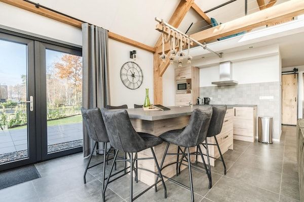 Keuken - Bungalow met uitzicht op vijver in Baarle-nassau (3)