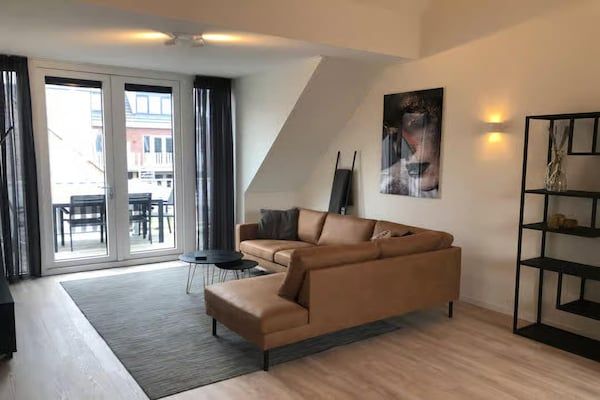 Woonkamer - 5-persoons lodge met privébalkon in Zoutelande (2)