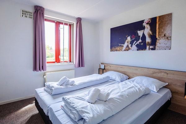 Slaapkamer - Vrijstaande bungalow aan de bosrand in Ewijk (5)