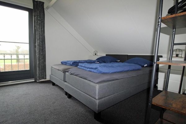 Slaapkamer - Moderne bungalow in Ewijk voor 6 personen in Ewijk (4)