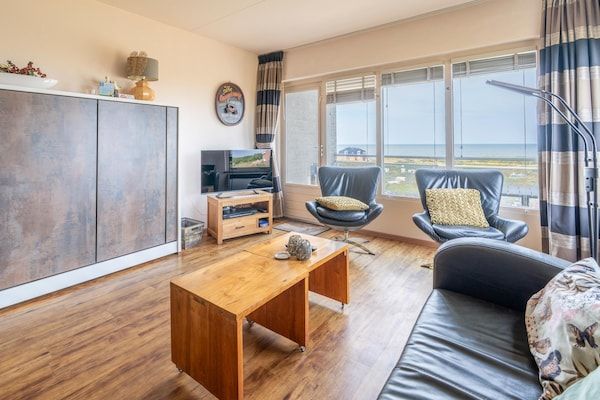 Woonkamer - 2 Persoons appartement met zeezicht en sauna in De Koog (2)