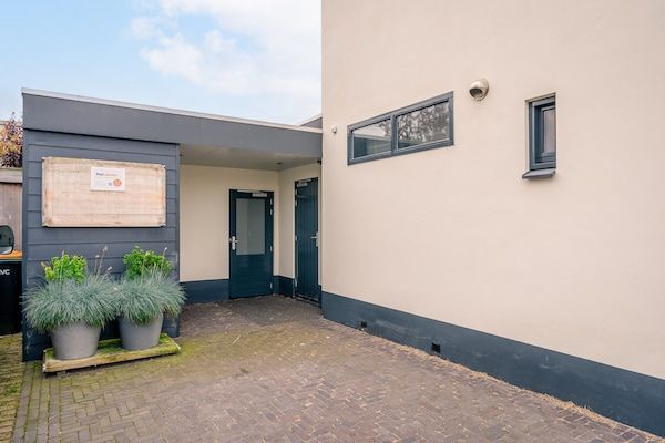 Terras - Sfeervolle 2-persoons vakantiewoning aan de Brink in De Koog in De Koog (1)