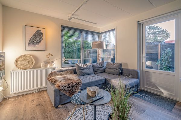 Woonkamer - Sfeervolle 2-persoons vakantiewoning in De Koog (2)
