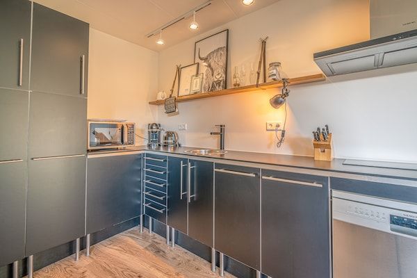 Keuken - Sfeervolle 2-persoons vakantiewoning in De Koog (5)