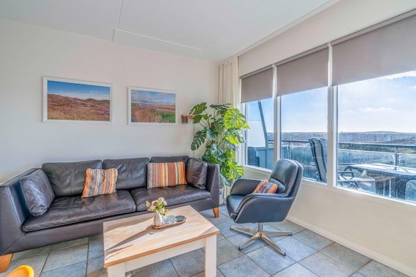 Woonkamer - 4 Persoons appartement met zeezicht in De Koog (3)