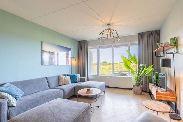 Woonkamer - 2 persoons eiland-zeezicht appartement met sauna in De Koog (1)