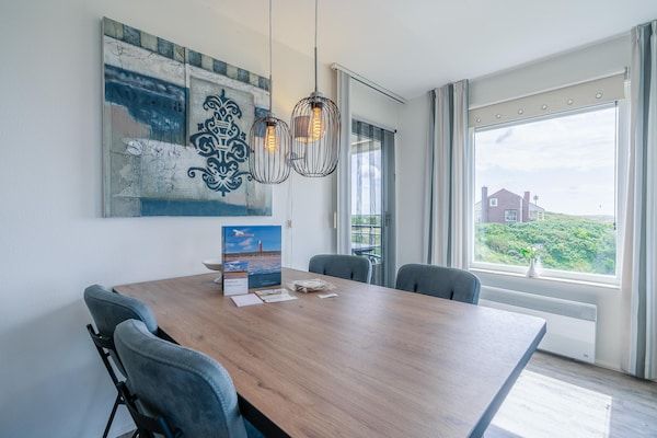 Woonkamer - 4 Persoons appartement met zeezicht in De Koog (5)