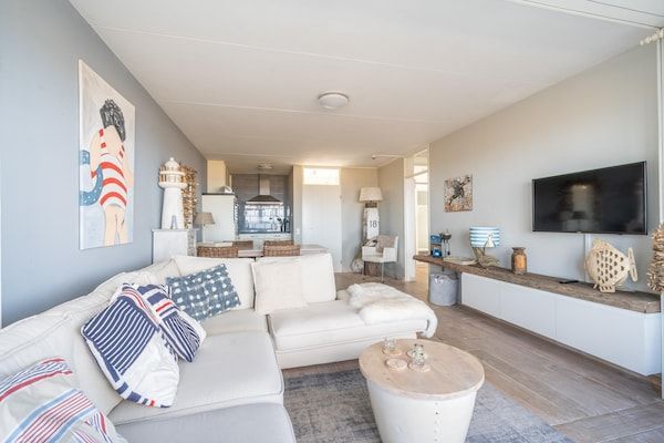 Woonkamer - 4 Persoons appartement met zeezicht in De Koog (1)