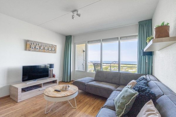 Woonkamer - 4 Persoons appartement met zeezicht in De Koog (3)