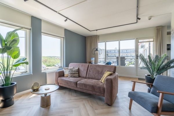 Woonkamer - 4 Persoons appartement met eilandzicht in De Koog (5)