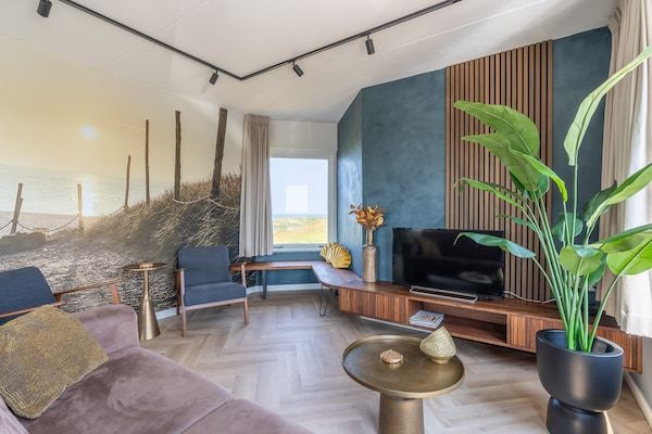 Woonkamer - 4 Persoons appartement met eilandzicht in De Koog (3)