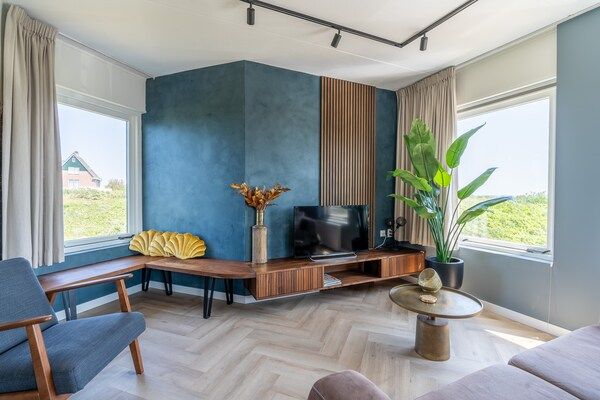 Woonkamer - 4 Persoons appartement met eilandzicht in De Koog (4)