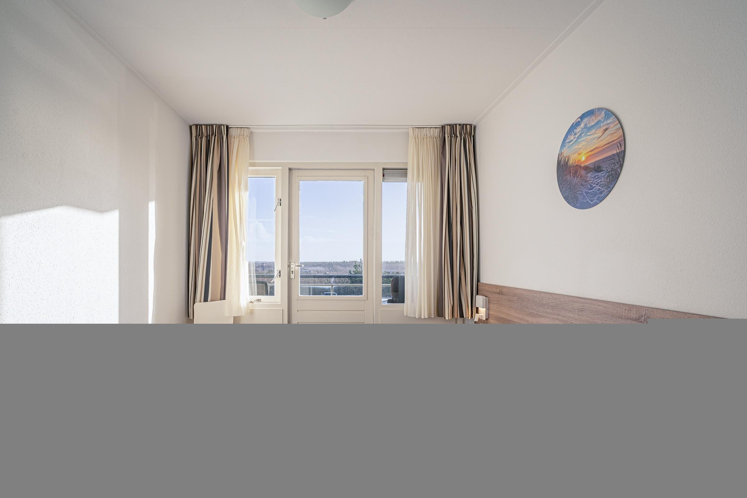 Eetkamer - 4 Persoons appartement met eilandzicht in De Koog (5)