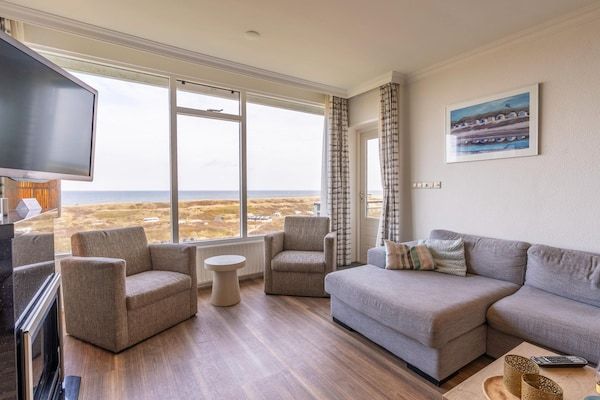 Woonkamer - 4 Persoons appartement met zeezicht in De Koog (5)