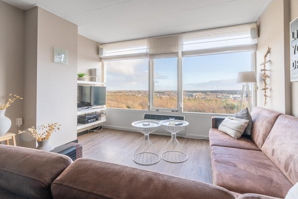 Woonkamer - 4 Persoons appartement met eilandzicht in De Koog (5)