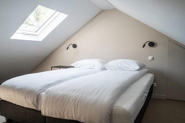 Slaapkamer - Ecovilla met uitzicht op het bos voor 6 personen in Oirschot (5)