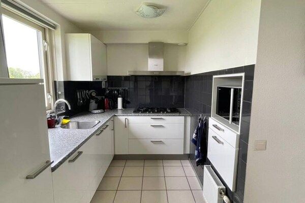 Keuken - Mooie woning voor 6 in park Ewijk in Ewijk (5)