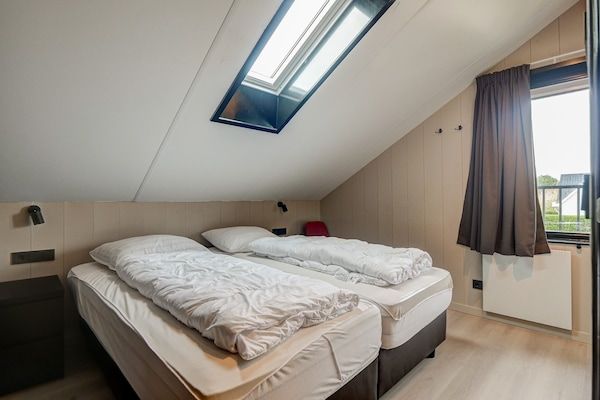 Slaapkamer - Vakantiehuis aan de kust in Julianadorp in Julianadorp aan zee (5)